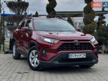Красный Тойота РАВ 4, объемом двигателя 2.49 л и пробегом 65 тыс. км за 20000 $, фото 1 на Automoto.ua