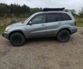 Сірий Тойота РАВ 4, об'ємом двигуна 2.2 л та пробігом 234 тис. км за 2000 $, фото 2 на Automoto.ua