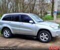 Серый Тойота РАВ 4, объемом двигателя 2 л и пробегом 300 тыс. км за 6500 $, фото 1 на Automoto.ua