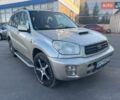 Серый Тойота РАВ 4, объемом двигателя 2 л и пробегом 340 тыс. км за 3000 $, фото 1 на Automoto.ua