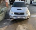 Серый Тойота РАВ 4, объемом двигателя 2 л и пробегом 244 тыс. км за 3650 $, фото 1 на Automoto.ua
