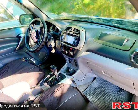 Серый Тойота РАВ 4, объемом двигателя 2 л и пробегом 300 тыс. км за 4500 $, фото 5 на Automoto.ua