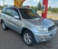 Серый Тойота РАВ 4, объемом двигателя 2 л и пробегом 209 тыс. км за 6900 $, фото 1 на Automoto.ua