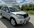 Сірий Тойота РАВ 4, об'ємом двигуна 2 л та пробігом 218 тис. км за 7349 $, фото 1 на Automoto.ua