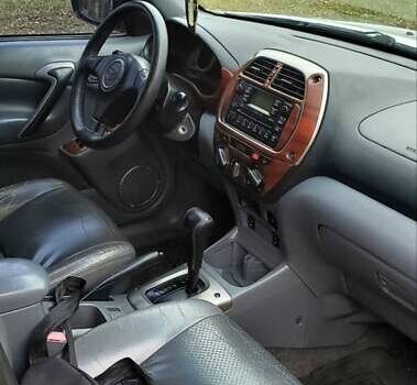 Серый Тойота РАВ 4, объемом двигателя 2 л и пробегом 325 тыс. км за 5999 $, фото 7 на Automoto.ua