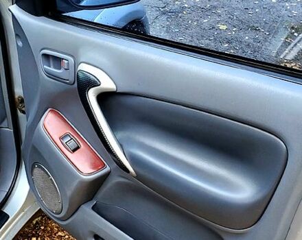 Серый Тойота РАВ 4, объемом двигателя 2 л и пробегом 230 тыс. км за 5850 $, фото 2 на Automoto.ua