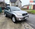Серый Тойота РАВ 4, объемом двигателя 2 л и пробегом 130 тыс. км за 6800 $, фото 1 на Automoto.ua