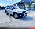 Серый Тойота РАВ 4, объемом двигателя 2 л и пробегом 245 тыс. км за 6800 $, фото 1 на Automoto.ua