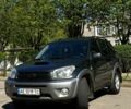 Серый Тойота РАВ 4, объемом двигателя 2 л и пробегом 350 тыс. км за 7500 $, фото 1 на Automoto.ua