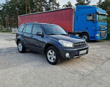 Серый Тойота РАВ 4, объемом двигателя 2 л и пробегом 470 тыс. км за 6400 $, фото 2 на Automoto.ua