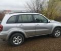 Серый Тойота РАВ 4, объемом двигателя 2 л и пробегом 241 тыс. км за 7000 $, фото 1 на Automoto.ua