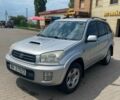 Серый Тойота РАВ 4, объемом двигателя 2 л и пробегом 370 тыс. км за 3600 $, фото 1 на Automoto.ua