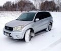 Серый Тойота РАВ 4, объемом двигателя 2 л и пробегом 231 тыс. км за 7700 $, фото 1 на Automoto.ua