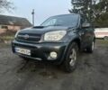 Серый Тойота РАВ 4, объемом двигателя 2 л и пробегом 310 тыс. км за 4200 $, фото 1 на Automoto.ua