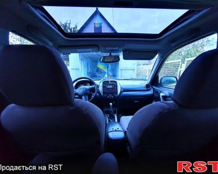 Серый Тойота РАВ 4, объемом двигателя 2 л и пробегом 261 тыс. км за 7200 $, фото 3 на Automoto.ua