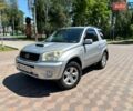 Серый Тойота РАВ 4, объемом двигателя 2 л и пробегом 247 тыс. км за 8399 $, фото 1 на Automoto.ua