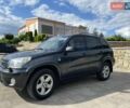 Серый Тойота РАВ 4, объемом двигателя 2 л и пробегом 257 тыс. км за 9500 $, фото 1 на Automoto.ua