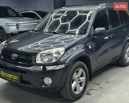 Сірий Тойота РАВ 4, об'ємом двигуна 2 л та пробігом 257 тис. км за 10200 $, фото 2 на Automoto.ua