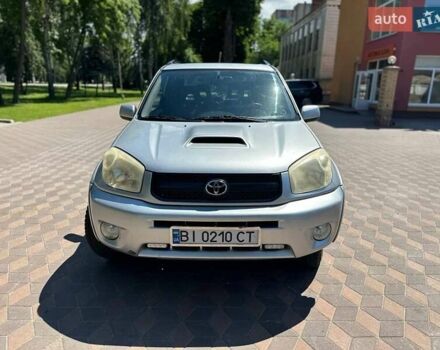 Серый Тойота РАВ 4, объемом двигателя 2 л и пробегом 247 тыс. км за 8399 $, фото 3 на Automoto.ua