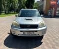 Серый Тойота РАВ 4, объемом двигателя 2 л и пробегом 247 тыс. км за 8399 $, фото 3 на Automoto.ua