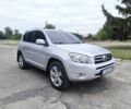 Сірий Тойота РАВ 4, об'ємом двигуна 2 л та пробігом 177 тис. км за 10499 $, фото 1 на Automoto.ua