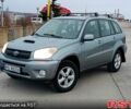 Серый Тойота РАВ 4, объемом двигателя 2 л и пробегом 250 тыс. км за 4250 $, фото 1 на Automoto.ua