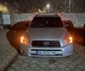 Серый Тойота РАВ 4, объемом двигателя 2.4 л и пробегом 298 тыс. км за 8200 $, фото 1 на Automoto.ua