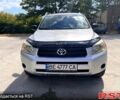 Серый Тойота РАВ 4, объемом двигателя 2.4 л и пробегом 245 тыс. км за 8700 $, фото 1 на Automoto.ua