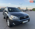 Серый Тойота РАВ 4, объемом двигателя 2 л и пробегом 260 тыс. км за 8900 $, фото 1 на Automoto.ua
