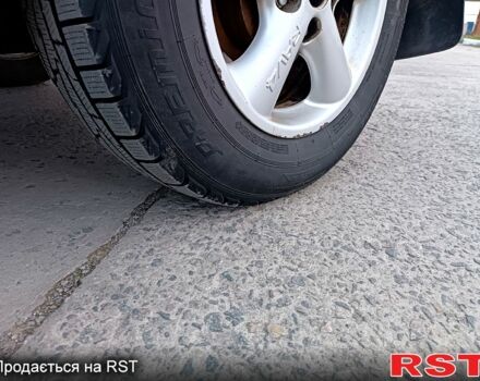 Серый Тойота РАВ 4, объемом двигателя 2 л и пробегом 250 тыс. км за 4250 $, фото 13 на Automoto.ua