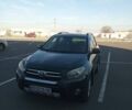 Серый Тойота РАВ 4, объемом двигателя 2.4 л и пробегом 155 тыс. км за 9000 $, фото 1 на Automoto.ua