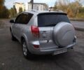 Серый Тойота РАВ 4, объемом двигателя 2.4 л и пробегом 250 тыс. км за 9000 $, фото 1 на Automoto.ua