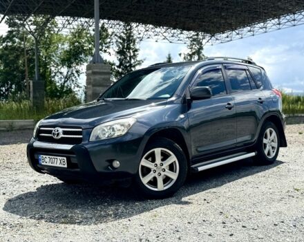 Серый Тойота РАВ 4, объемом двигателя 2 л и пробегом 241 тыс. км за 9400 $, фото 1 на Automoto.ua