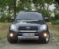 Сірий Тойота РАВ 4, об'ємом двигуна 2 л та пробігом 210 тис. км за 11500 $, фото 1 на Automoto.ua