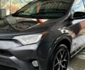 Серый Тойота РАВ 4, объемом двигателя 2.5 л и пробегом 120 тыс. км за 23000 $, фото 1 на Automoto.ua