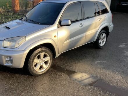 Серый Тойота РАВ 4, объемом двигателя 2 л и пробегом 244 тыс. км за 3650 $, фото 1 на Automoto.ua