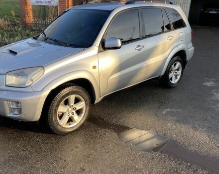 Серый Тойота РАВ 4, объемом двигателя 2 л и пробегом 244 тыс. км за 3650 $, фото 1 на Automoto.ua