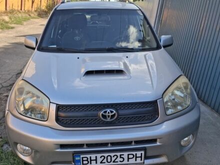 Сірий Тойота РАВ 4, об'ємом двигуна 2 л та пробігом 289 тис. км за 7035 $, фото 1 на Automoto.ua