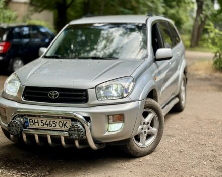 Серый Тойота РАВ 4, объемом двигателя 2 л и пробегом 300 тыс. км за 6399 $, фото 1 на Automoto.ua
