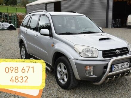 Сірий Тойота РАВ 4, об'ємом двигуна 2 л та пробігом 250 тис. км за 2001 $, фото 1 на Automoto.ua