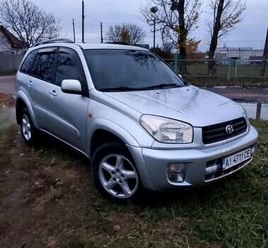 Серый Тойота РАВ 4, объемом двигателя 2 л и пробегом 325 тыс. км за 5999 $, фото 1 на Automoto.ua