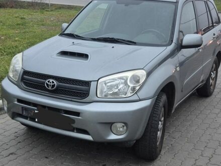 Серый Тойота РАВ 4, объемом двигателя 2 л и пробегом 405 тыс. км за 1425 $, фото 1 на Automoto.ua