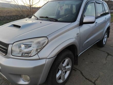 Серый Тойота РАВ 4, объемом двигателя 2 л и пробегом 320 тыс. км за 3800 $, фото 1 на Automoto.ua