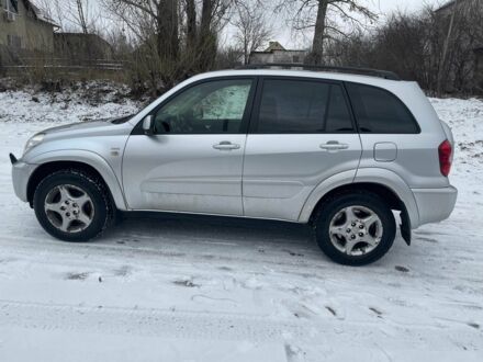 Сірий Тойота РАВ 4, об'ємом двигуна 2 л та пробігом 202 тис. км за 8999 $, фото 1 на Automoto.ua