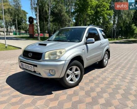 Серый Тойота РАВ 4, объемом двигателя 2 л и пробегом 247 тыс. км за 8399 $, фото 1 на Automoto.ua