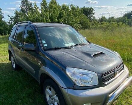 Серый Тойота РАВ 4, объемом двигателя 2 л и пробегом 186 тыс. км за 7300 $, фото 1 на Automoto.ua