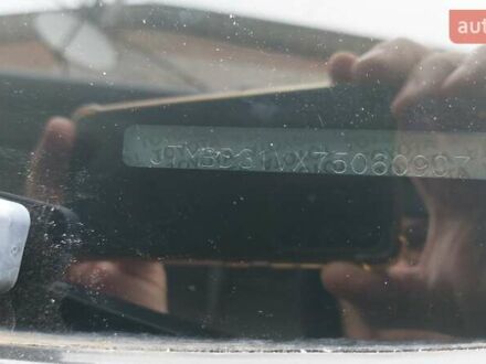 Серый Тойота РАВ 4, объемом двигателя 2.4 л и пробегом 224 тыс. км за 9000 $, фото 1 на Automoto.ua