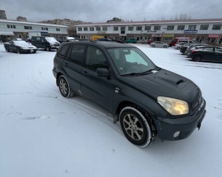 Серый Тойота РАВ 4, объемом двигателя 2 л и пробегом 318 тыс. км за 3950 $, фото 1 на Automoto.ua