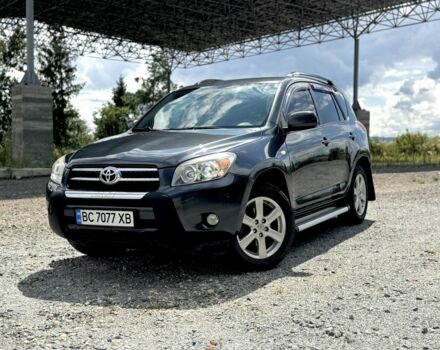 Серый Тойота РАВ 4, объемом двигателя 2 л и пробегом 241 тыс. км за 9400 $, фото 1 на Automoto.ua