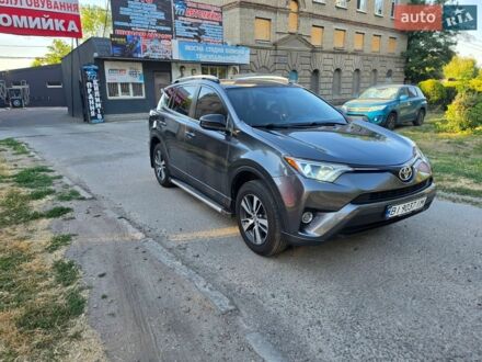 Сірий Тойота РАВ 4, об'ємом двигуна 2.49 л та пробігом 245 тис. км за 14500 $, фото 1 на Automoto.ua
